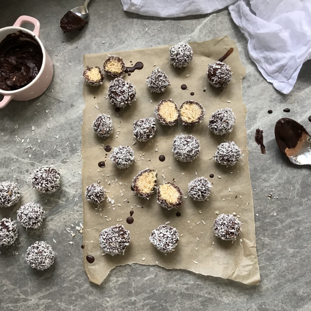 Chocolate Coated Coconut Bliss Balls - Nourishing Amy