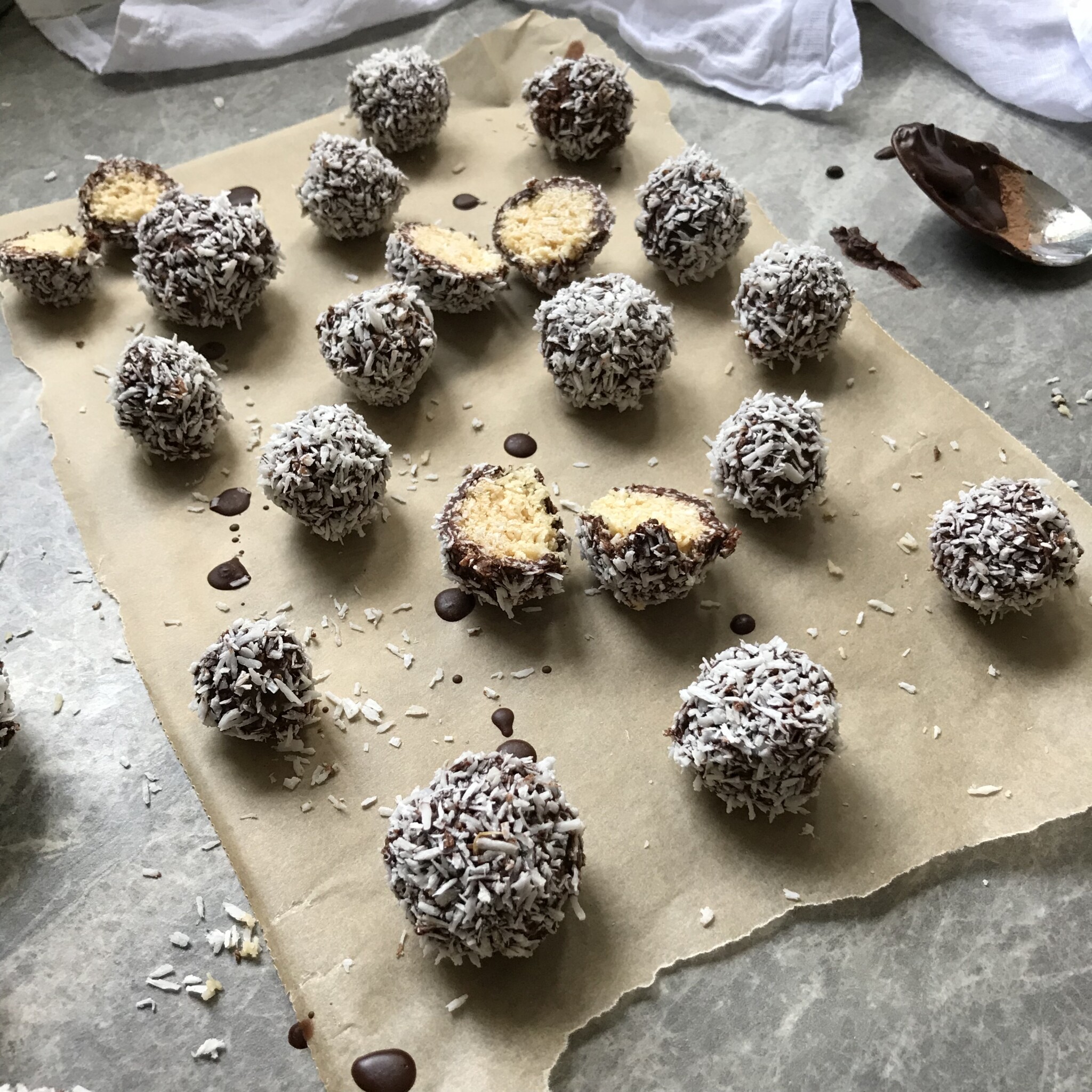 Chocolate Coated Coconut Bliss Balls - Nourishing Amy