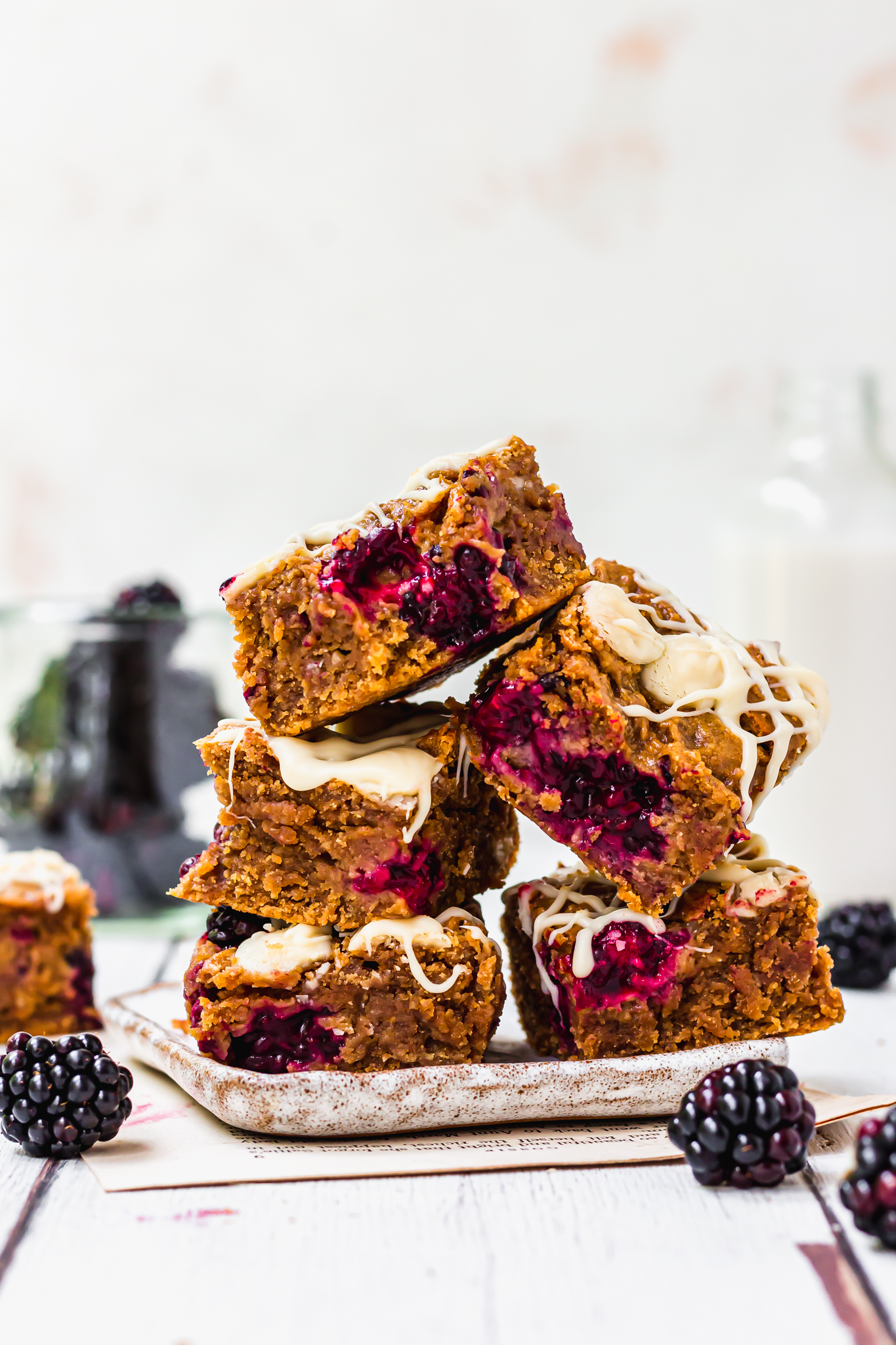 A stack of five Blackberry White Chocolate Blondies