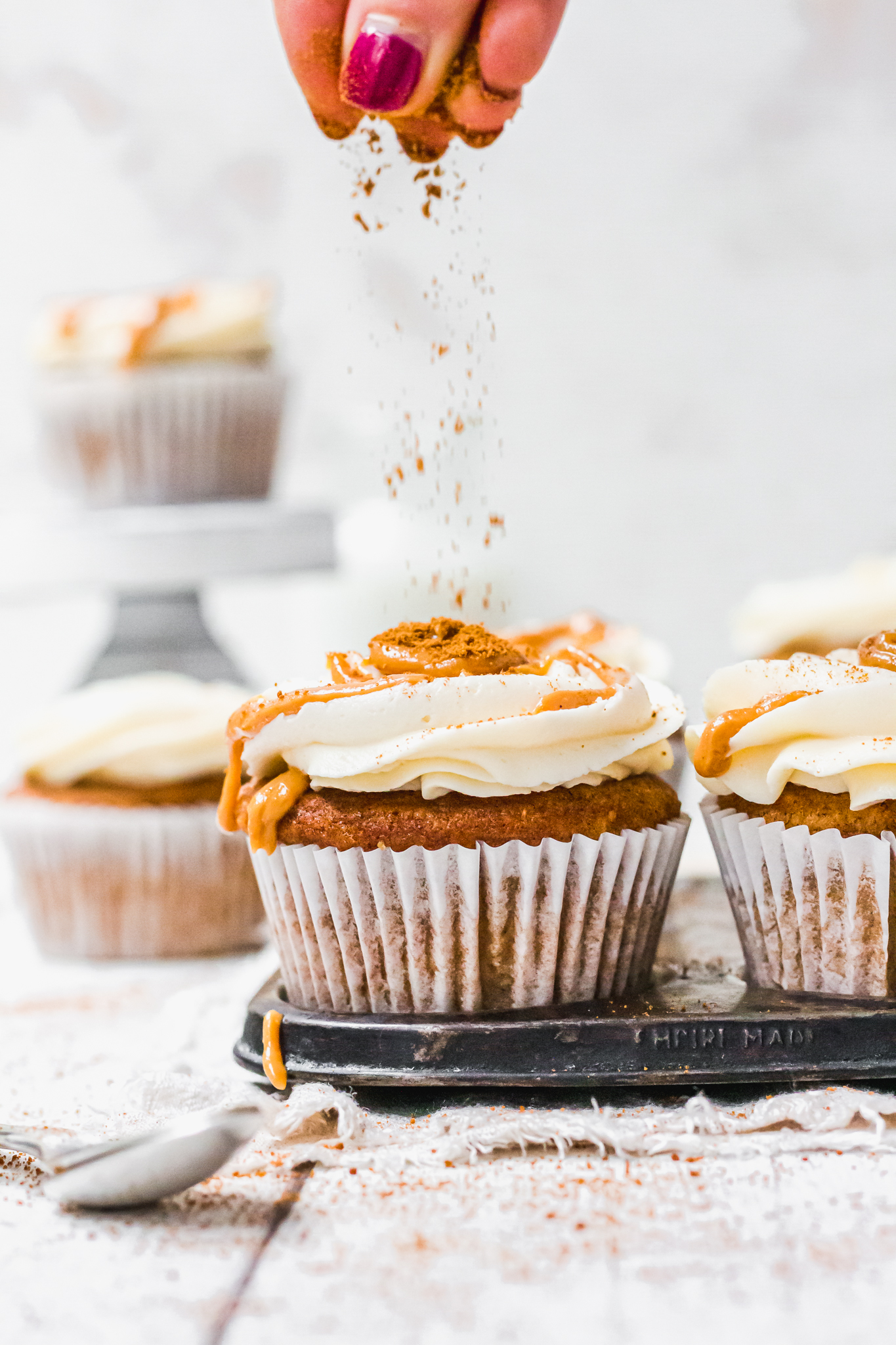 Chai Pumpkin Spice Cupcakes with Vanilla Buttercream and a sprinkle of cinnamon