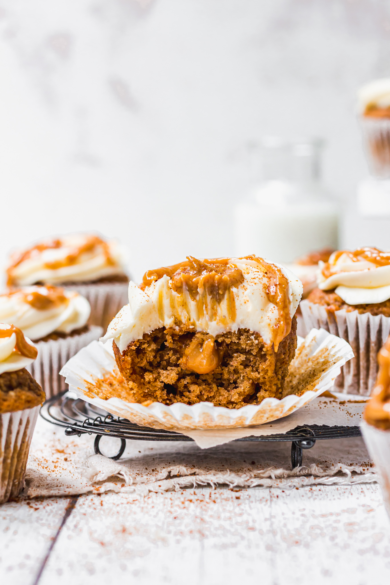 Chai Pumpkin Spice Cupcakes with Vanilla Buttercream with a gooey middle