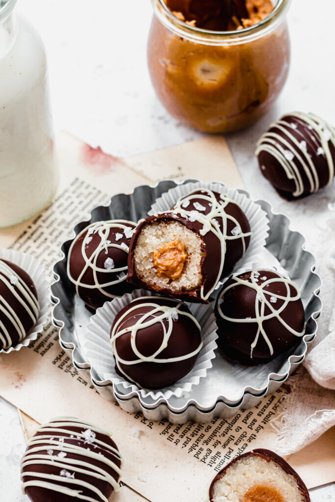 Chocolate Salted Caramel Cake Balls in a metal round tray
