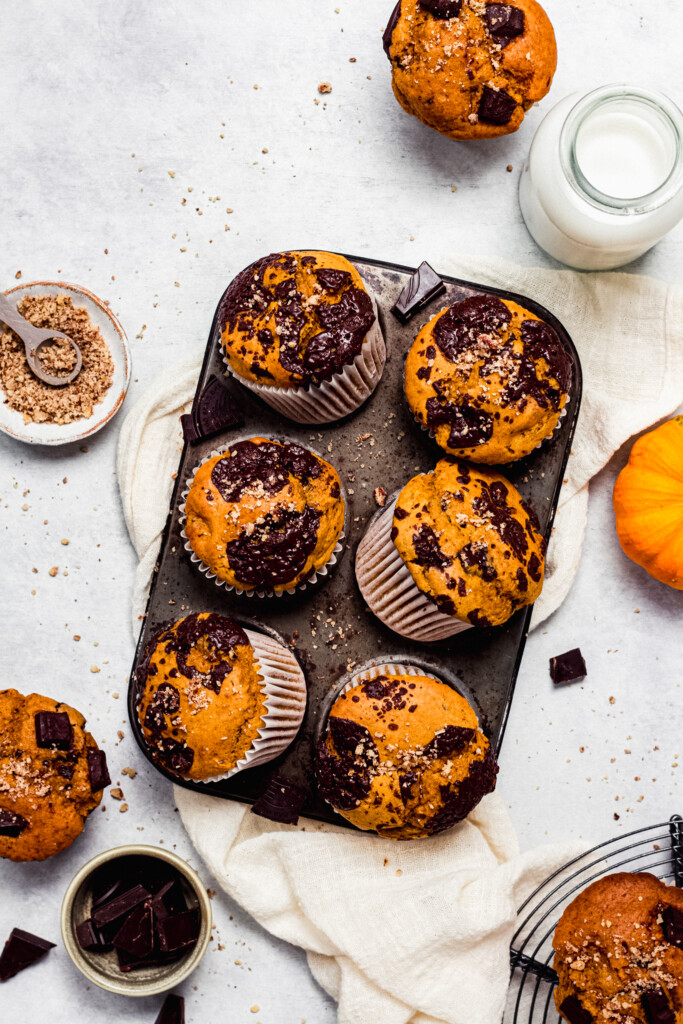 Chocolate Sweet Potato Muffins on a metal muffin tray