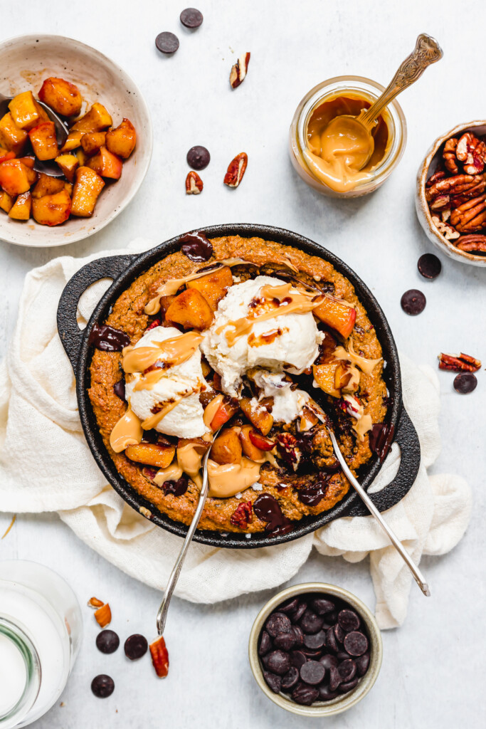 Toffee Apple Chocolate Chip Cookie Skillet with two spoons