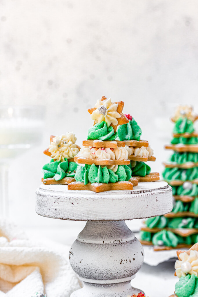 Christmas Tree Sugar Cookies on a small cake stand