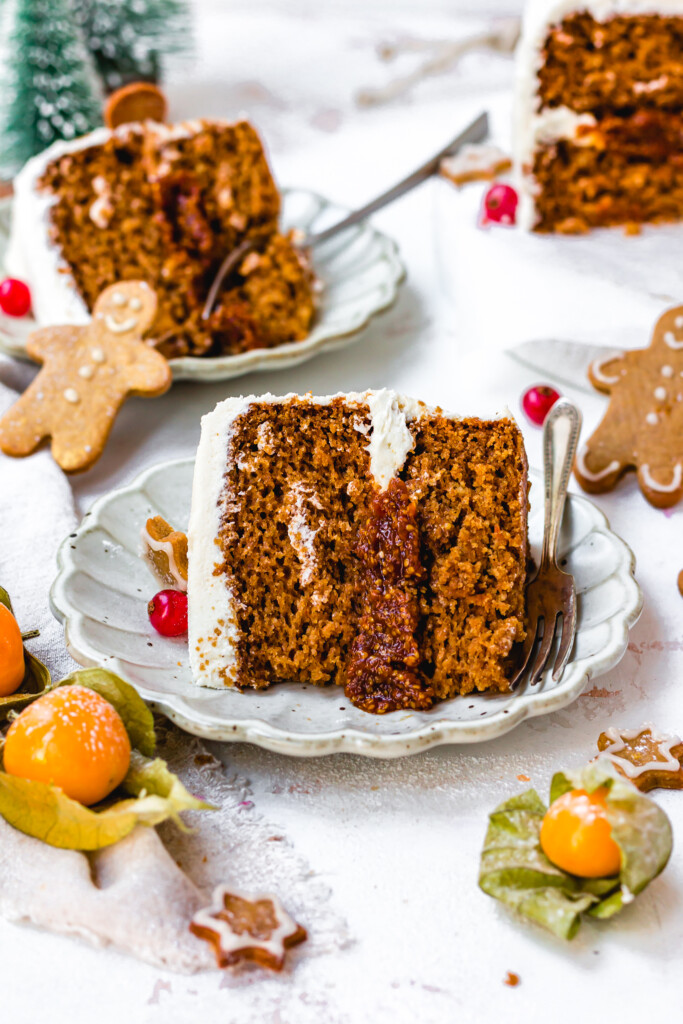 A slice of Gingerbread Goldenberry Christmas Cake with a fork