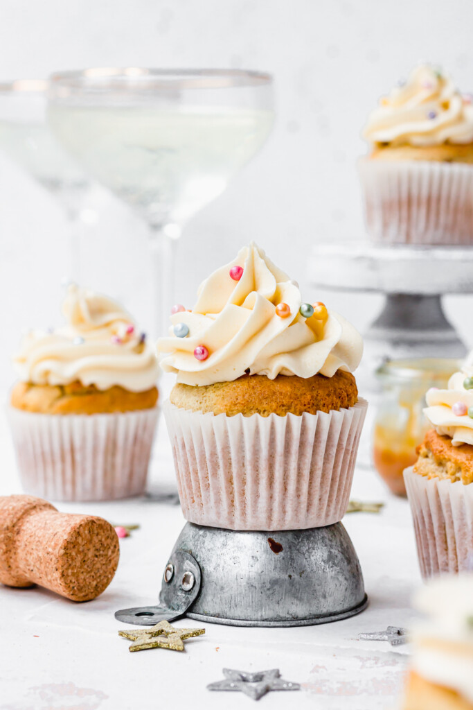 Vegan Champagne Cupcakes with White Chocolate Buttercream on a metal pot