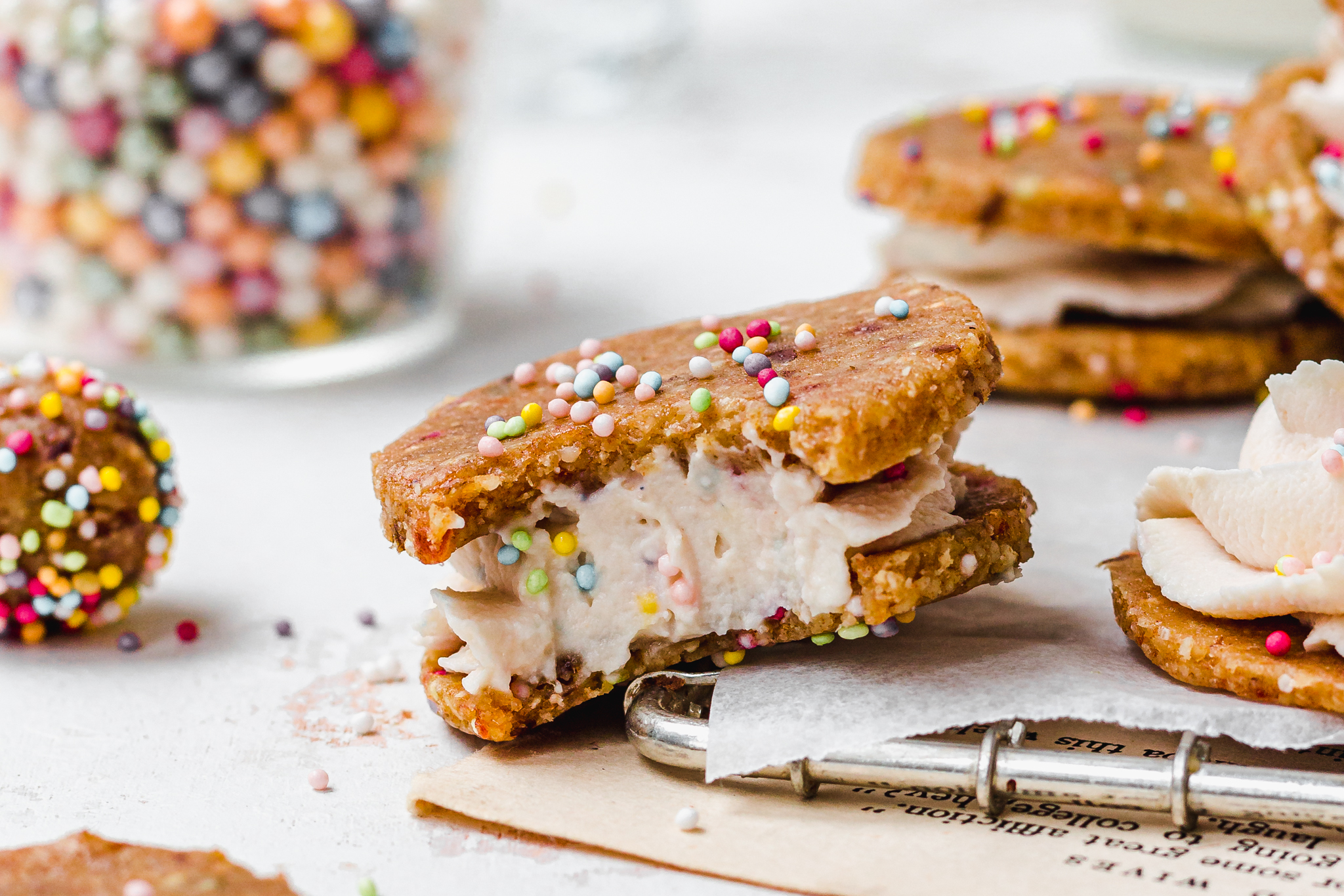 No Bake Funfetti Cookie Sandwiches on a wire rack
