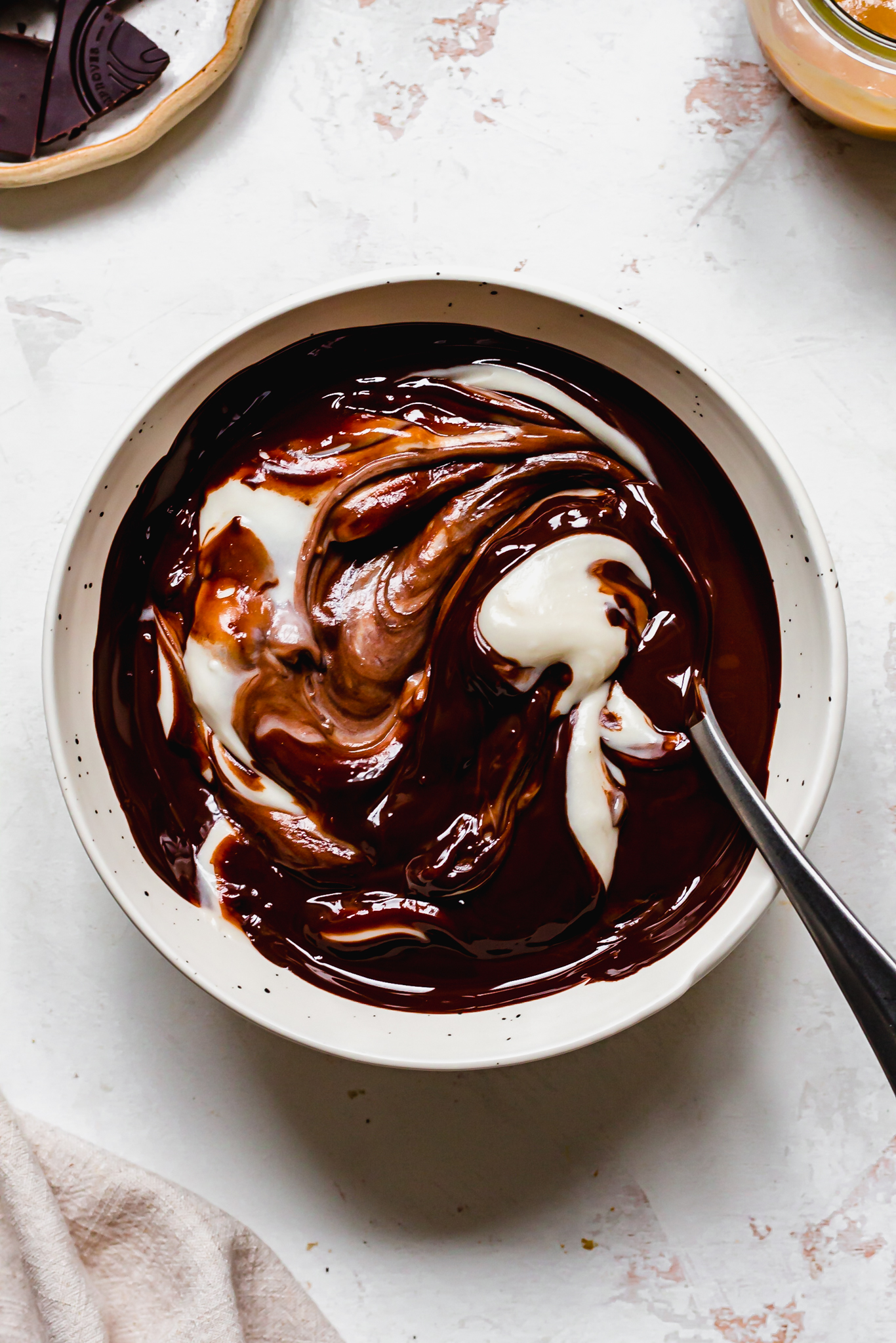 Bowl of chocolate and cream cheese frosting
