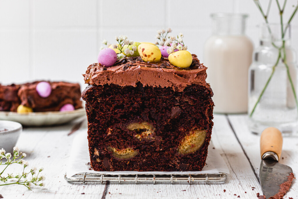 A sliced open Vegan Double Chocolate Fig Loaf Cake