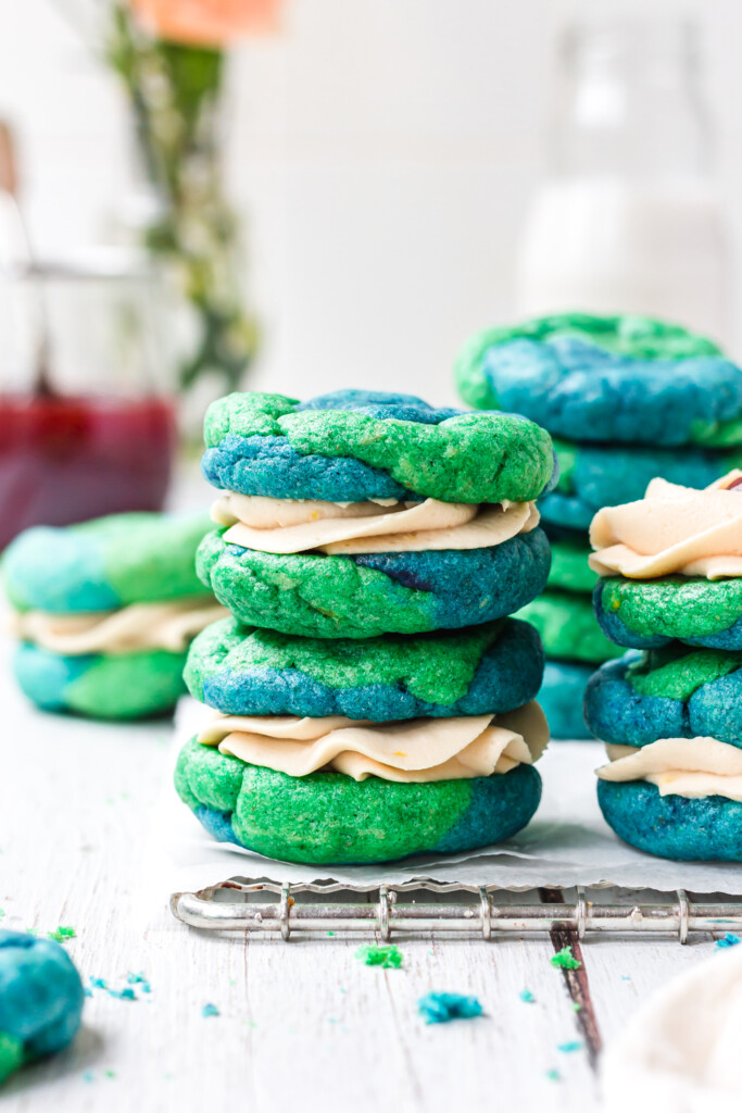 Two Vegan Earth Day Cookie Sandwiches on top of one another