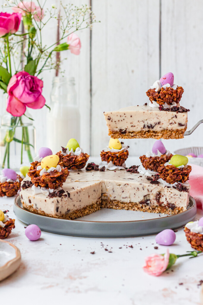Lifting out a slice of Vegan Easter Cheesecake