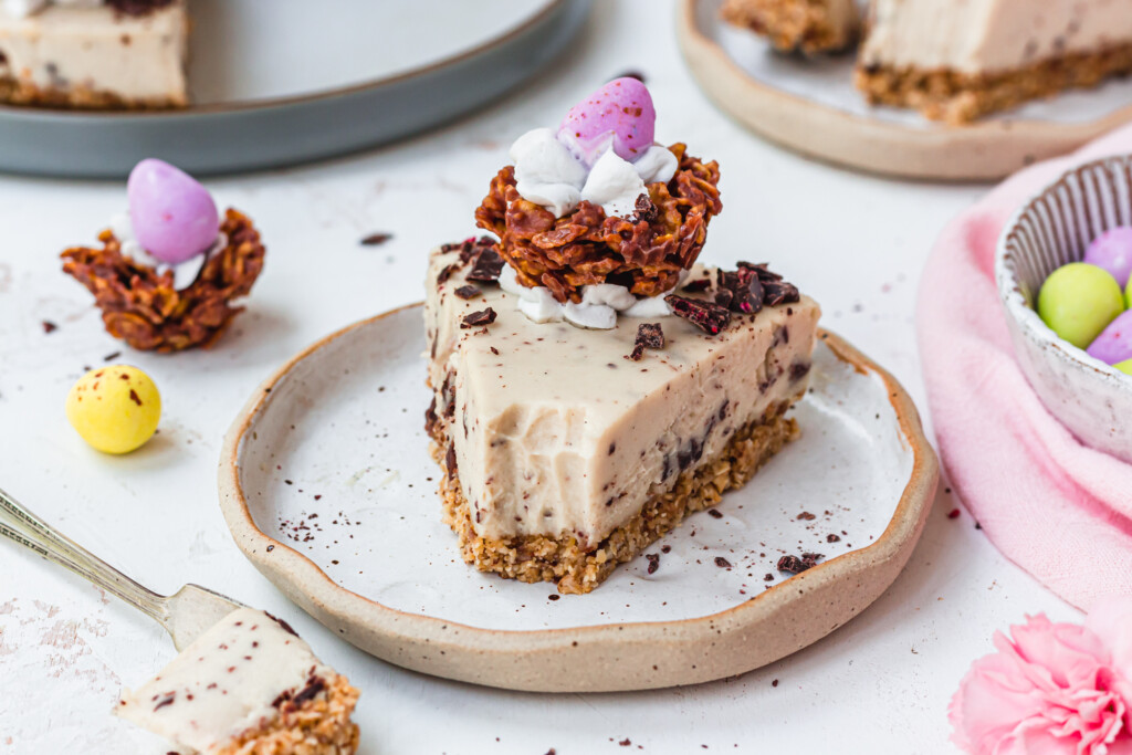 Landscape image of a slice of Vegan Easter Cheesecake
