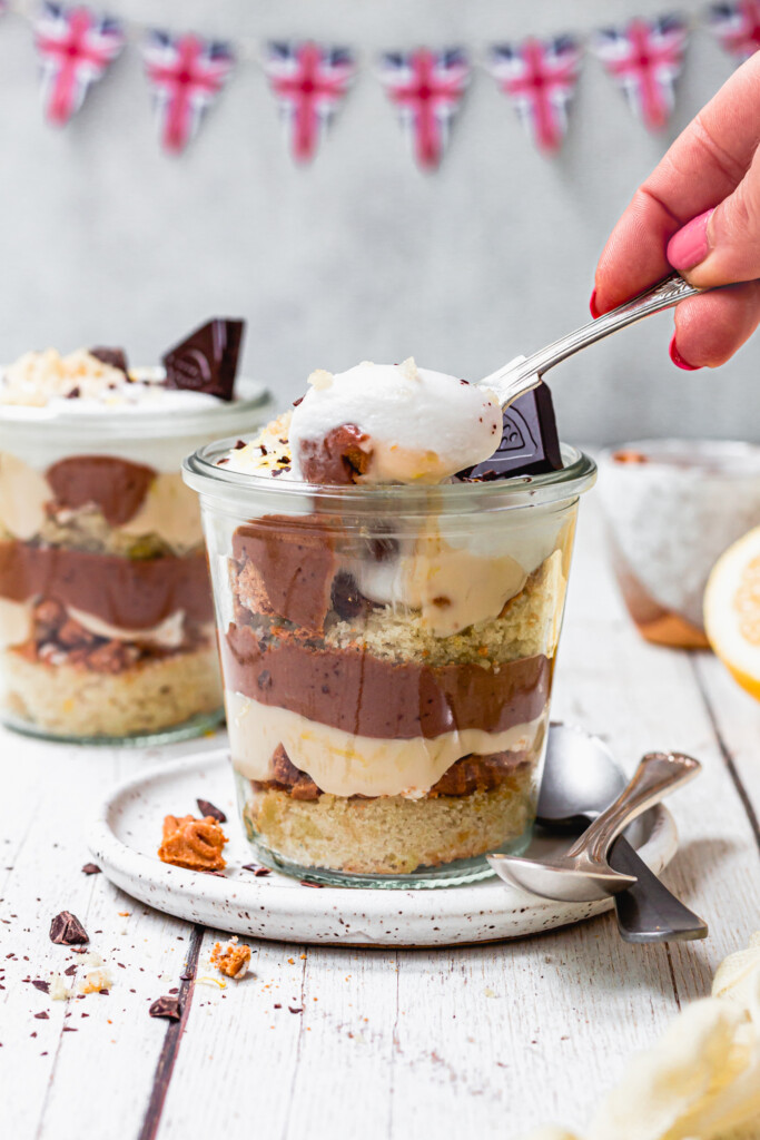 Taking a spoon of Chocolate Lemon Trifle from the jar