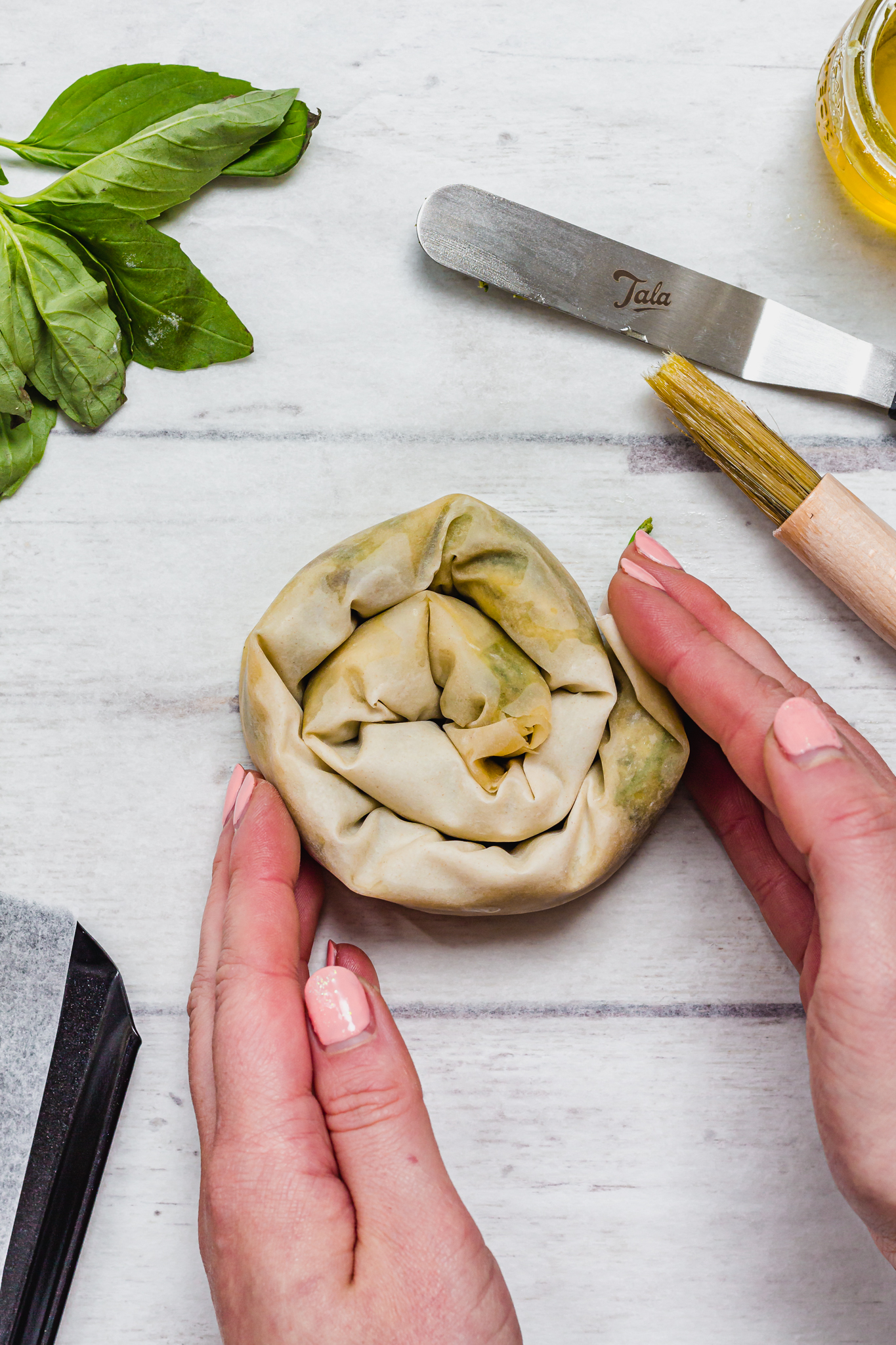 Rolling the Vegan Pesto Feta Filo Pastry Swirls