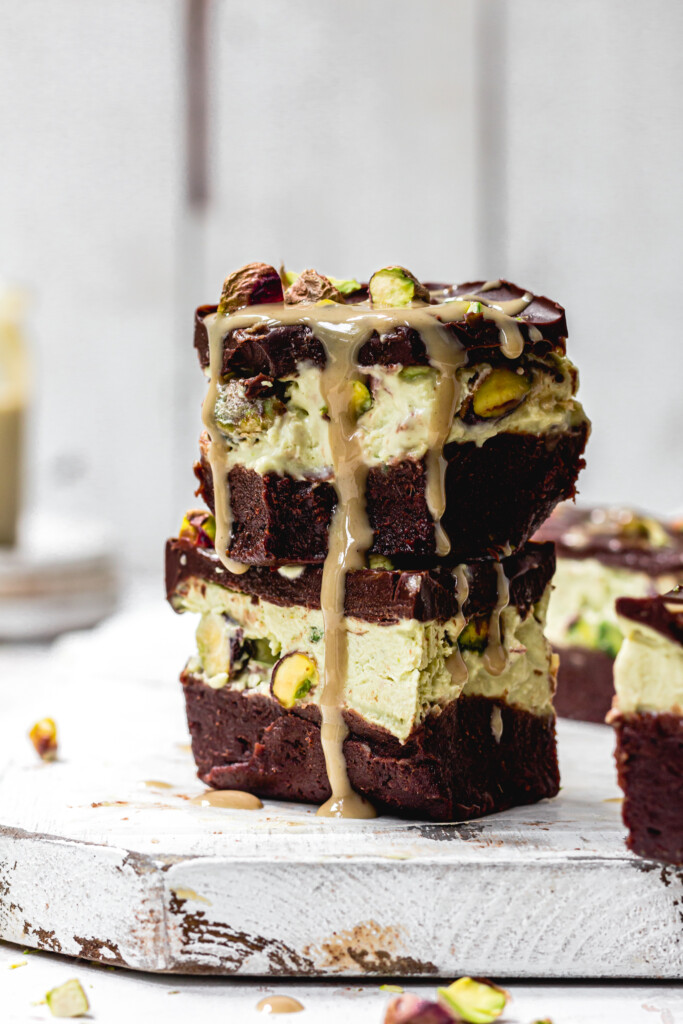 Two Pistachio Ice Cream Brownie Slices drizzled in tahini