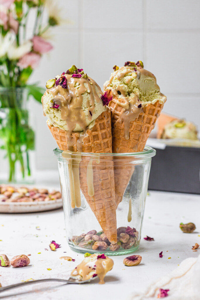 Two cones of Tahini Pistachio Ice Cream
