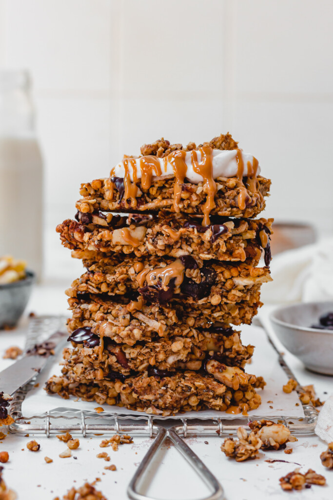 A stack of Banoffee Granola Bark with yoghurt and peanut butter