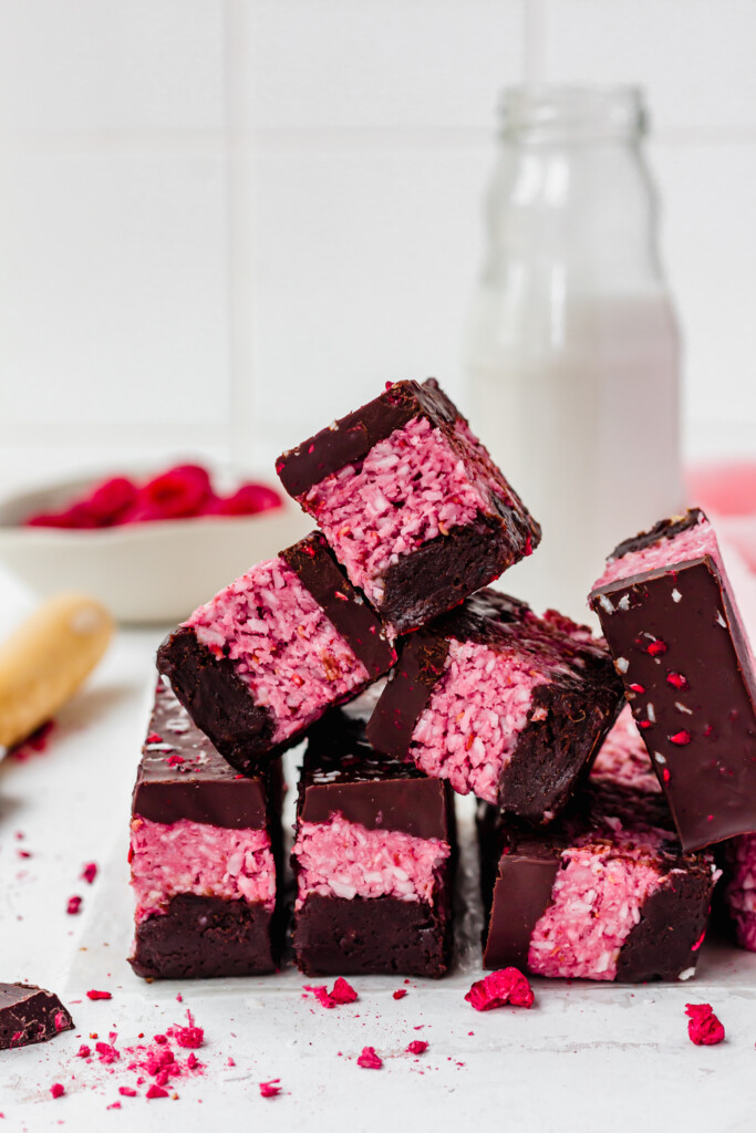 A stack of Chocolate Raspberry Coconut Slices