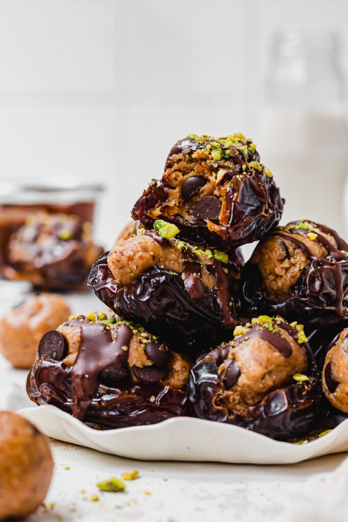 Close up of a stack of Cookie Dough Stuffed Dates