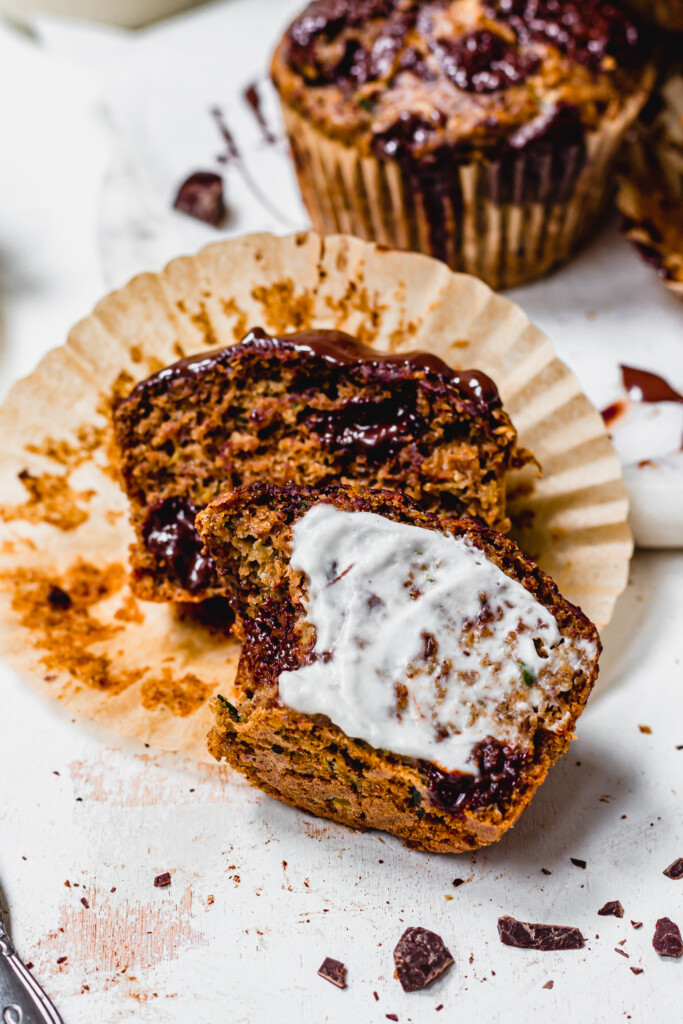 Half Chocolate Chunk Courgette Muffin spread with yoghurt