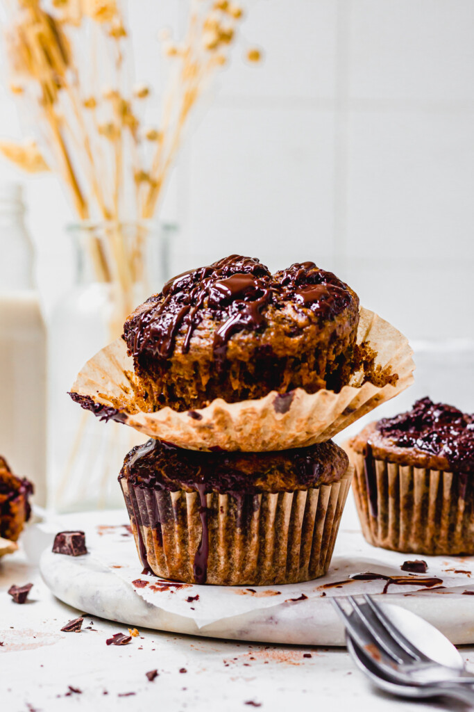 Two Chocolate Chunk Courgette Muffins on top of each other