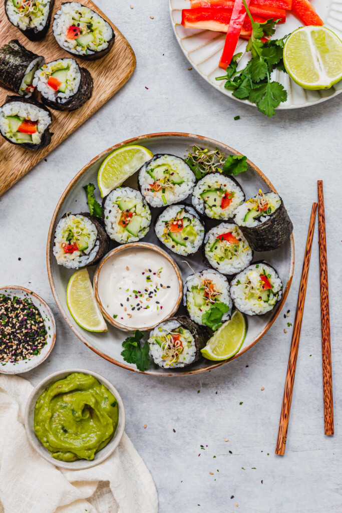 A bowl of Garlic Cucumber and Avocado Sushi Rolls