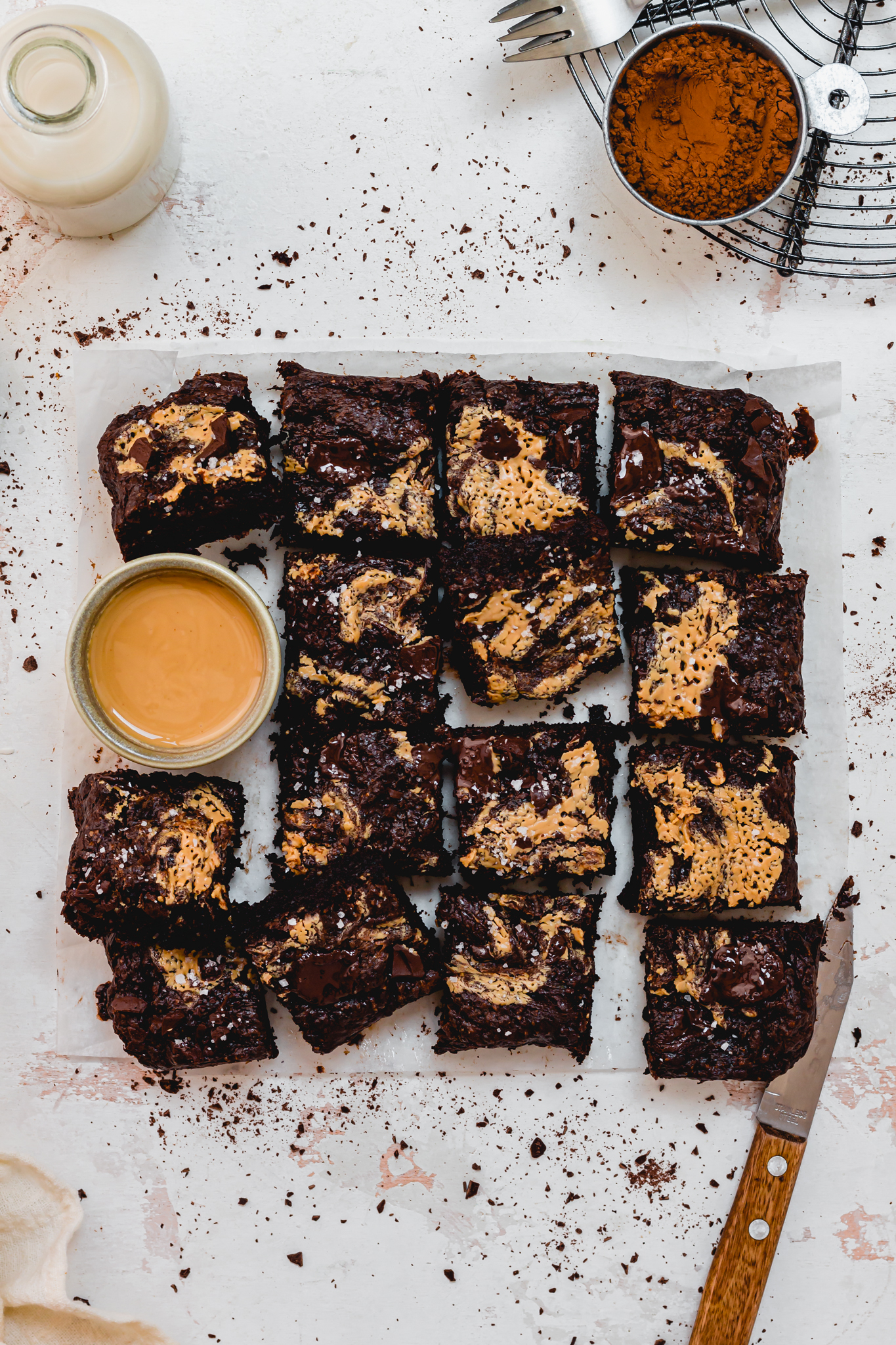 Chocolate Courgette Fudge Brownies on a board cut into 16