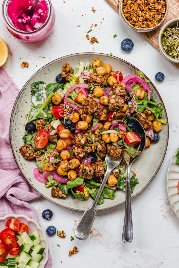 Crispy Chickpea Crouton Salad with Balsamic Dressing with two spoons