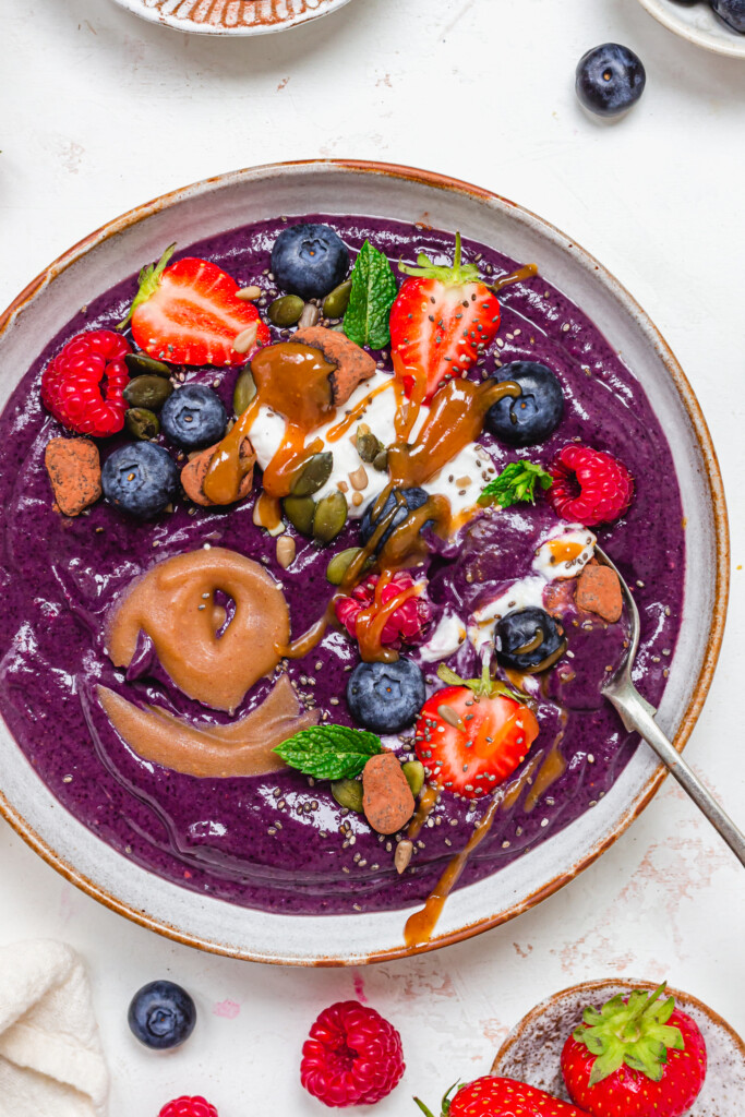 Spoon in a Blueberry Caramel Smoothie Bowl