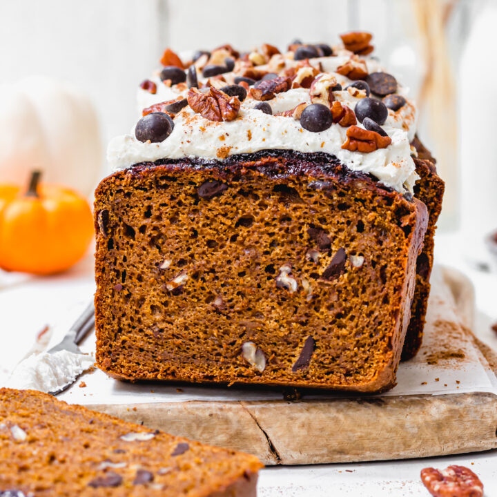 Chocolate Chip Chai Pumpkin Loaf on a wooden board