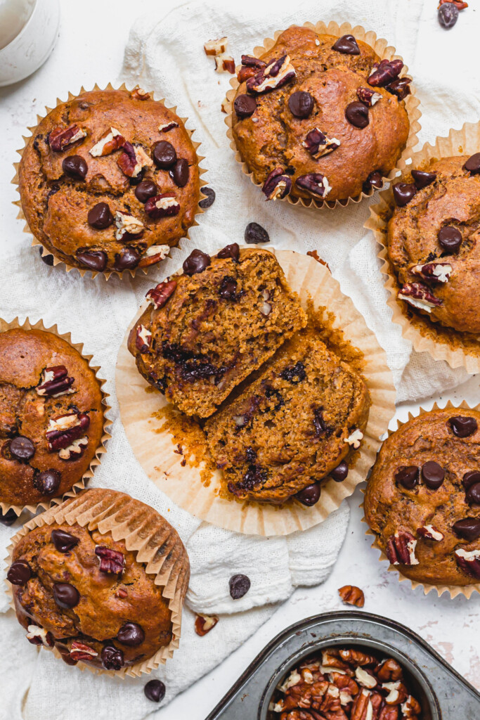 Chocolate Chip Pecan Pumpkin Muffins with one cut open