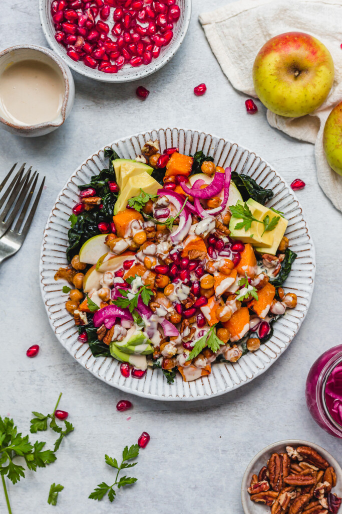 A bowl of Ginger Roasted Squash and Chickpea Salad with Tahini