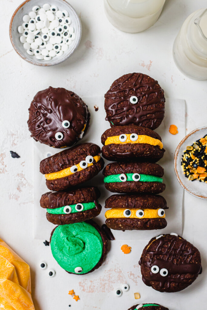 Several Halloween Chocolate Oreo Cookies on a white board