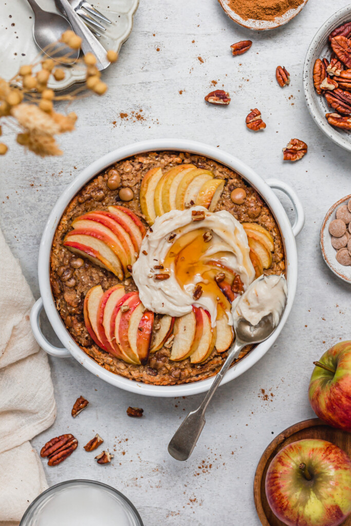 Toffee Apple Pecan Baked Oats with a spoon of yoghurt