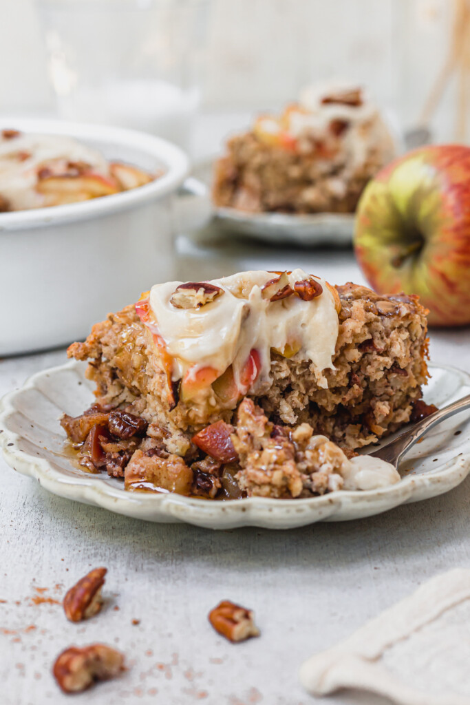 A piece of Toffee Apple Pecan Baked Oats with a fork