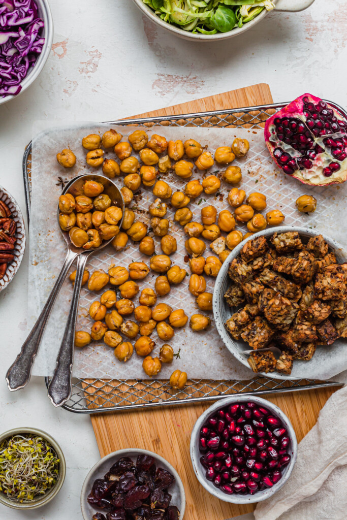 Crunchy chickpeas and croutons on a wire tray