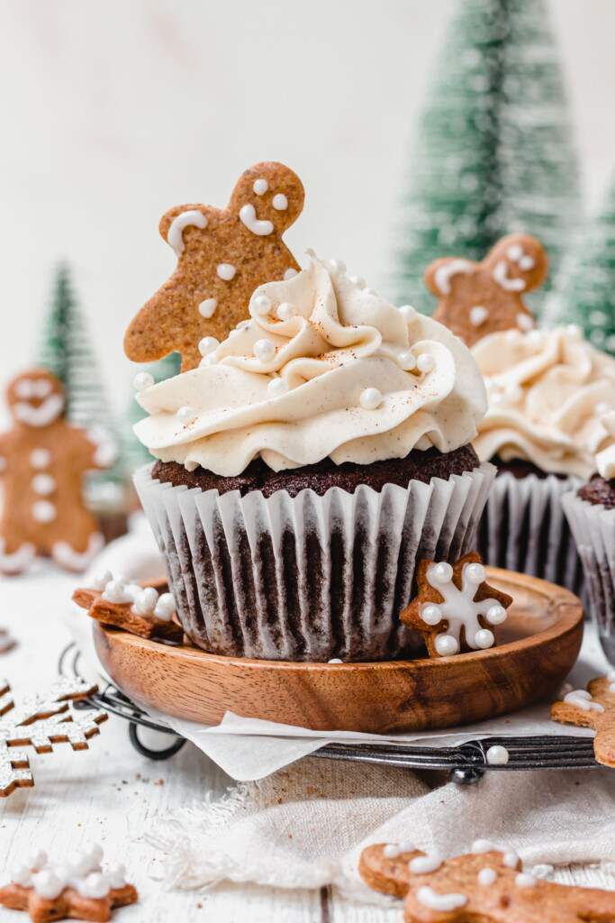 A Chocolate Gingerbread Cupcake with a little gingerbread cookie