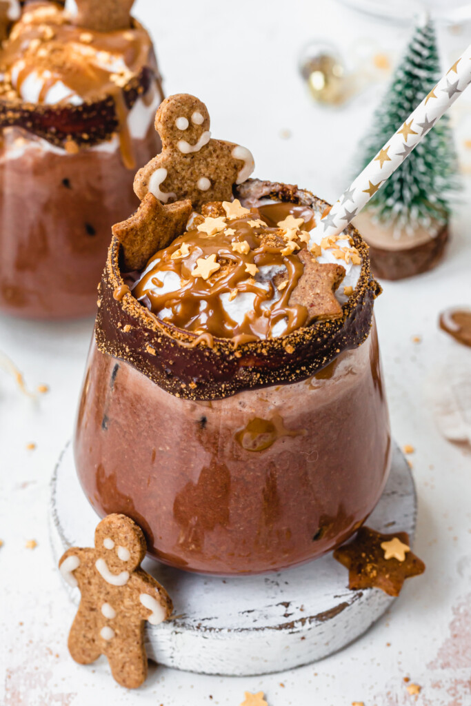 The top of a Chocolate Gingerbread Mocktail with whipped cream and sprinkles