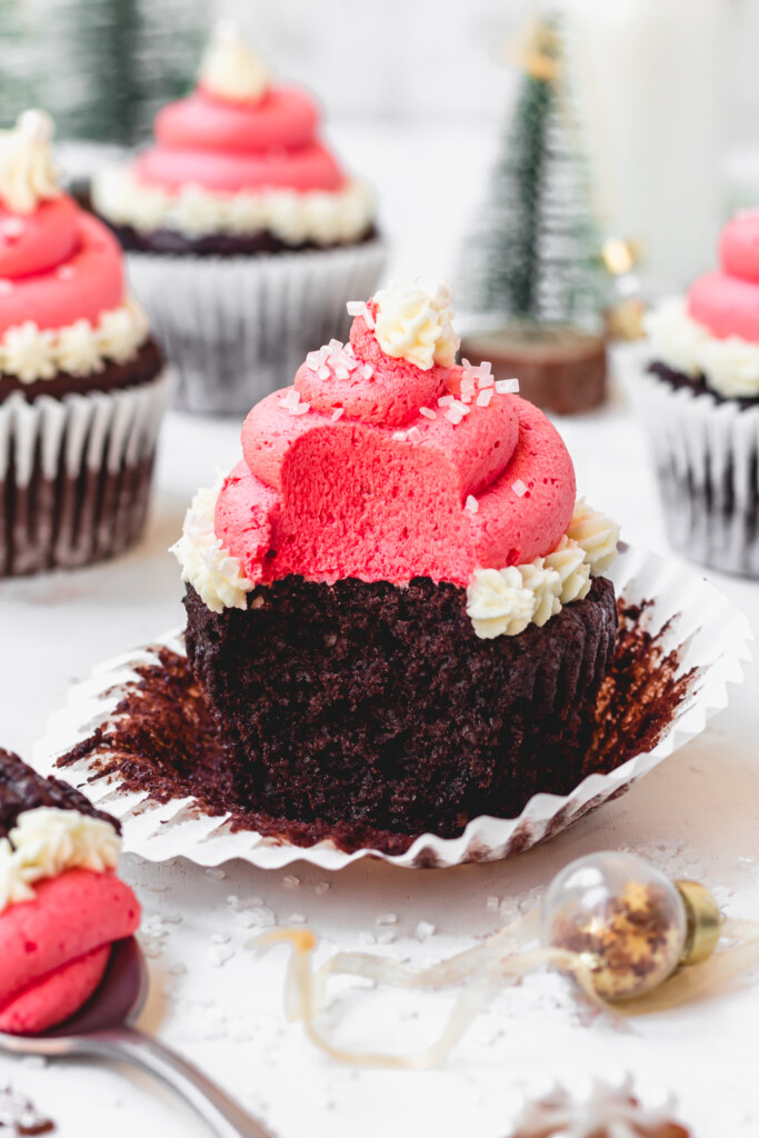 Half eaten Christmas Hat Chocolate Cupcake with a fork