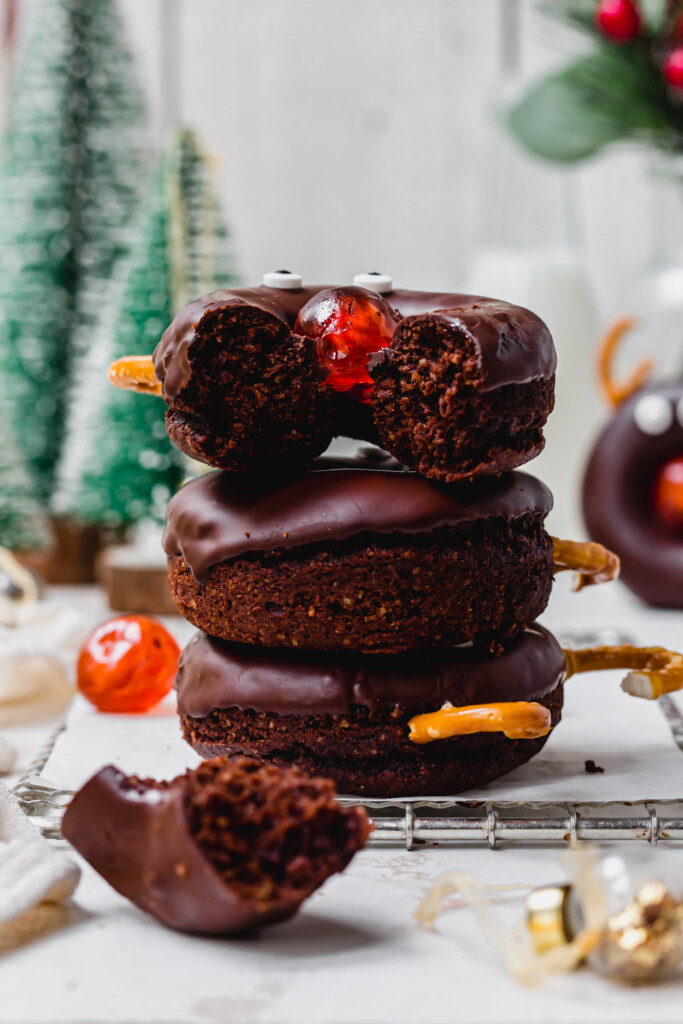 A stack of three Reindeer Chocolate Doughnuts