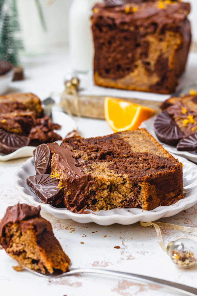 A slice of Vegan Chocolate Orange Banana Bread with a forkful removed