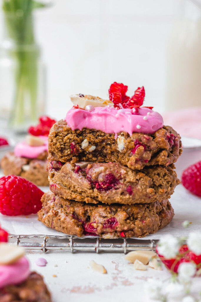 A stack of three Raspberry White Chocolate Oat Cookies