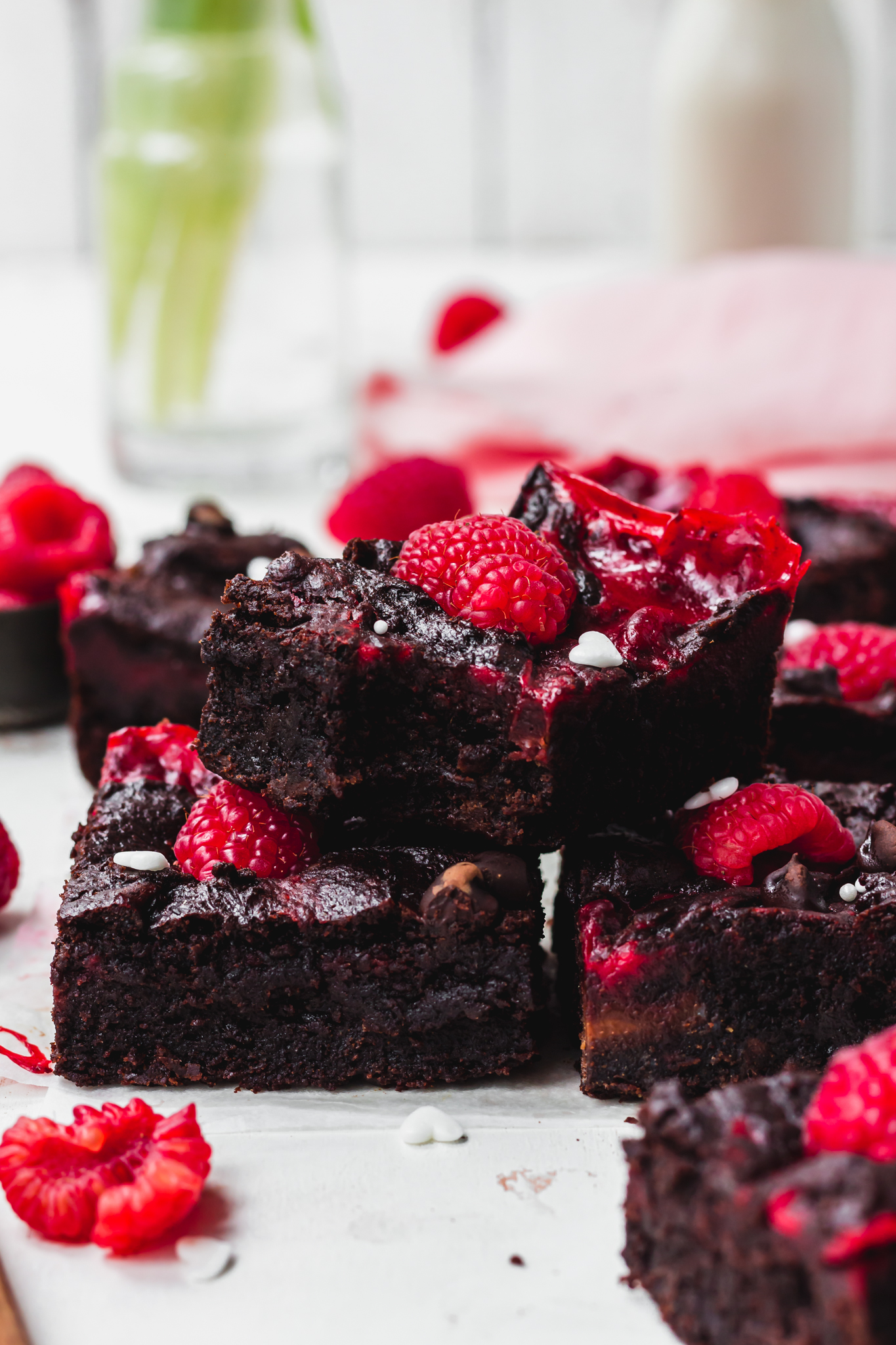 A stack of three Red Velvet Cheesecake Brownies