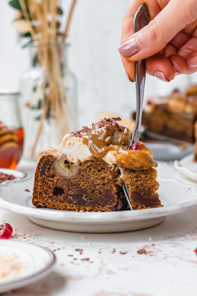 A fork and a slice of Sticky Toffee Banana Bread Pudding cake
