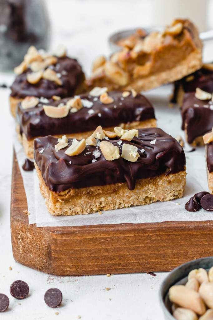 A few Vegan Protein Snickers on a wooden board