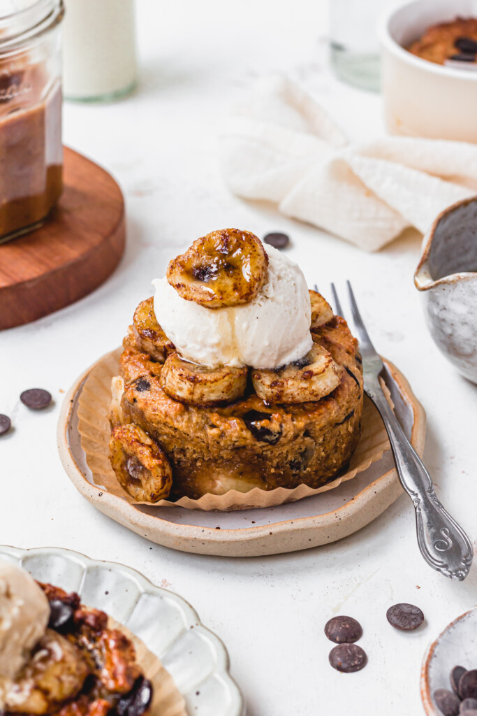 A mini Chocolate Chip Salted Caramel Cookie Skillet with ice cream and bananas