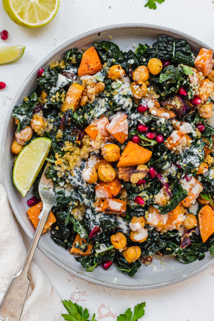 Close up of Crispy Quinoa Squash and Kale Salad with Garlic Tahini