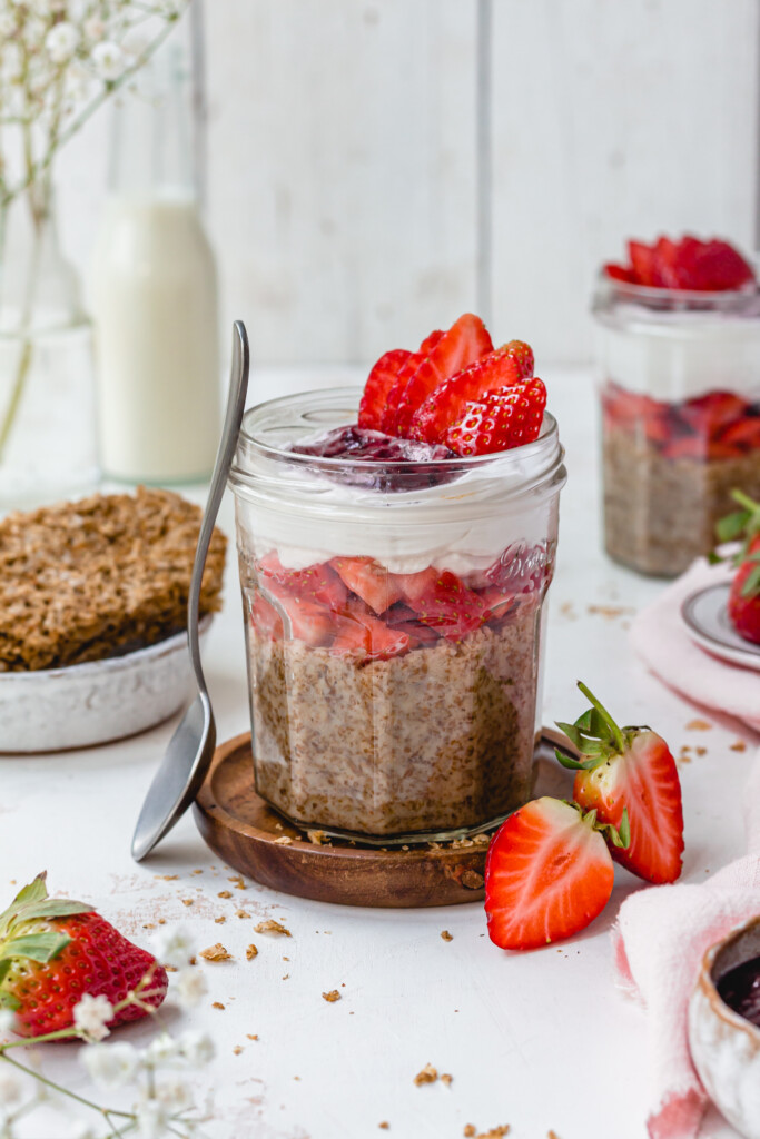 A jar of Strawberry Overnight Weetabix with a spoon