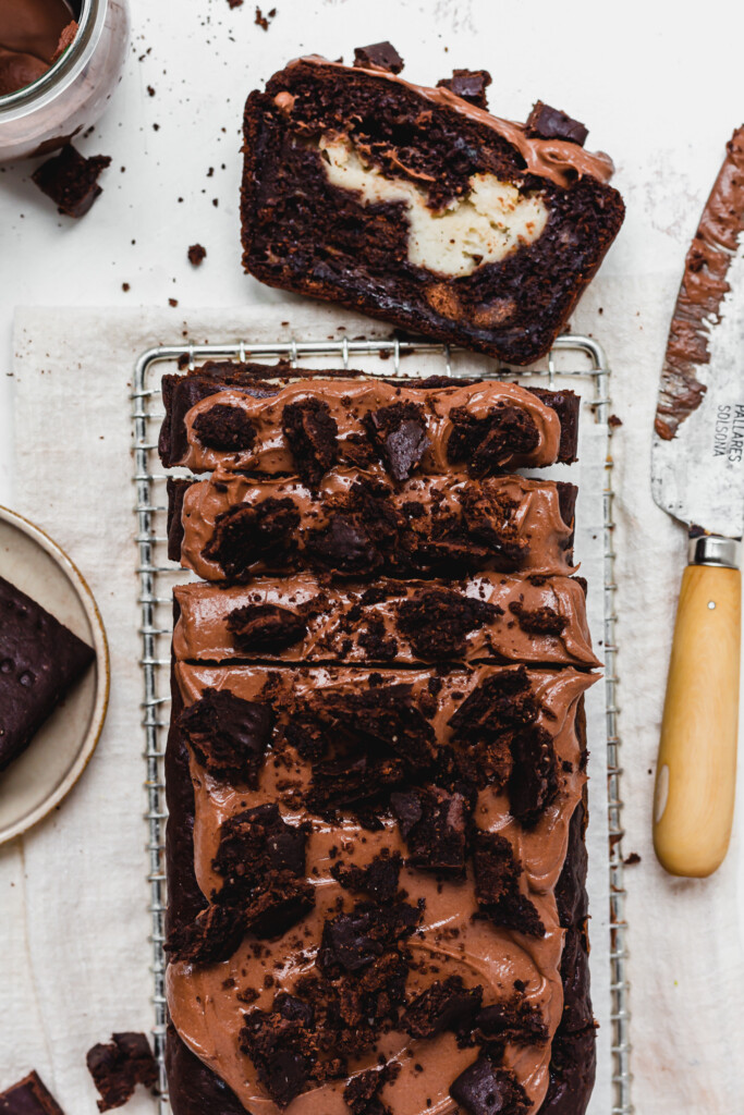 Three slices cut from a loaf of Chocolate Bourbon Biscuit Banana Bread